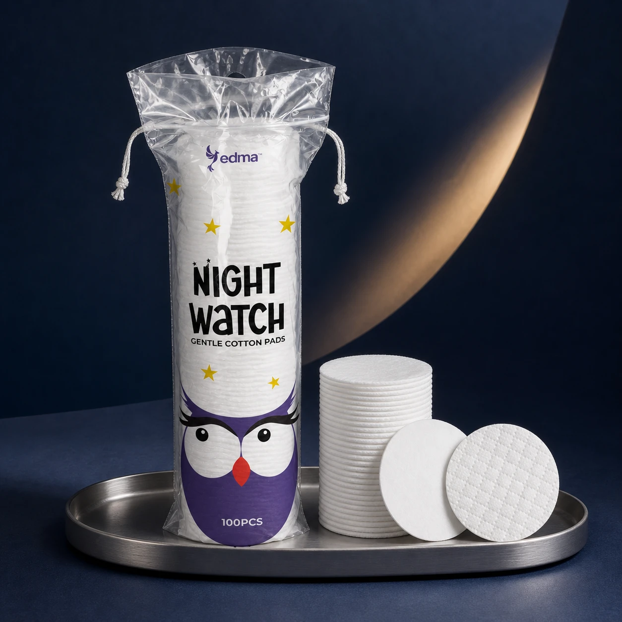NightWatch 100-piece bag with smooth and textured cotton pads on a silver tray