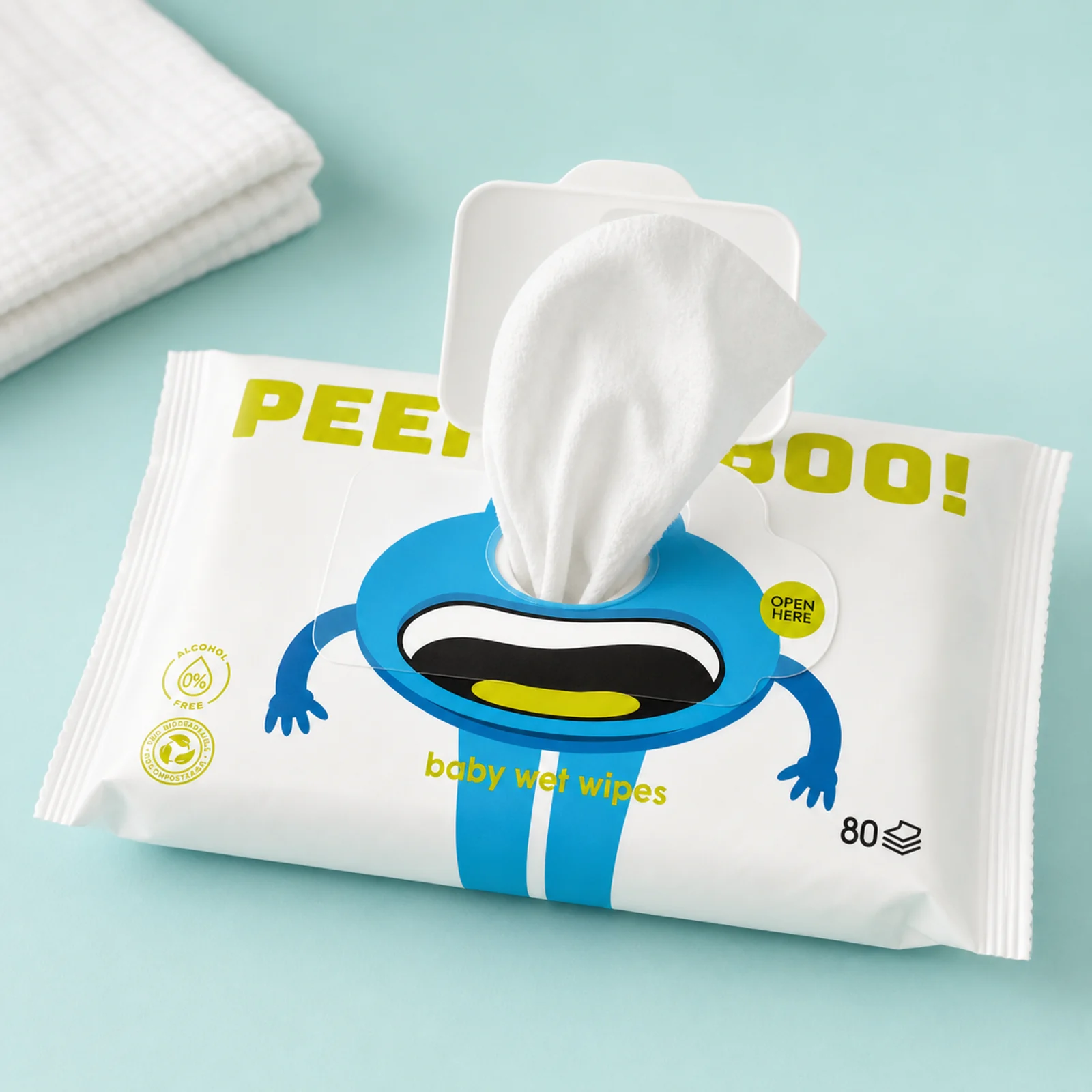 Open Peek-a-Boo pouch with a white wipe emerging through the centre opening